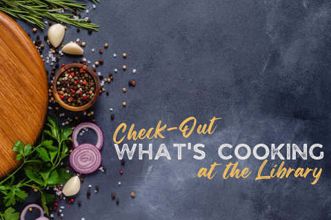 A picture of various food items on a black chalkboard background with the words "Check out what's cooking at the Library"