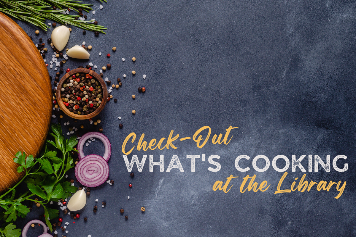 A picture of various food items on a black chalkboard background with the words "Check out what's cooking at the Library"